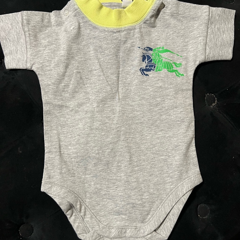Burberry onsie never worn.